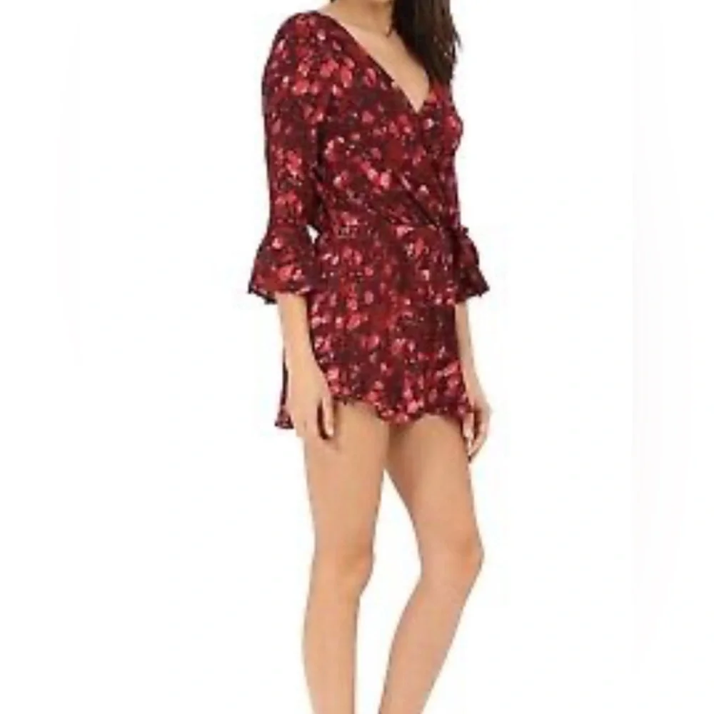 Free People All The Right Ruffles in Wild Moon Floral Romper Size XS OB397455.